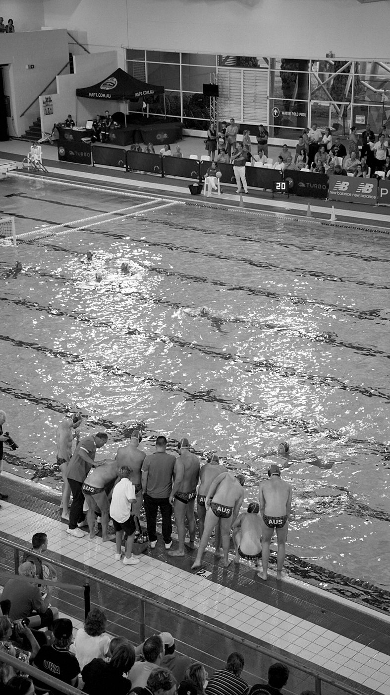 A team talk on the pool deck